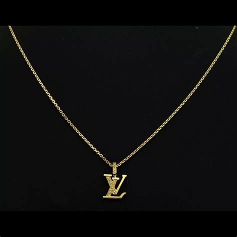 louis vuitton symbol necklace|Louis Vuitton monogram necklace.